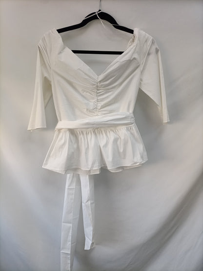 ZARA. Top blanco volante T.l