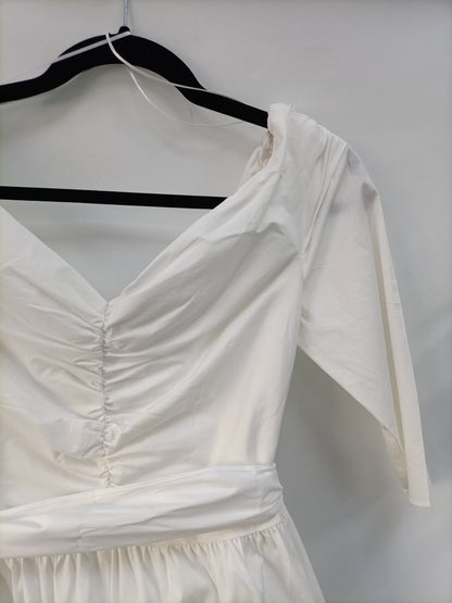 ZARA. Top blanco volante T.l