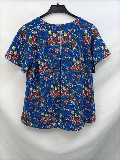 ZARA. Blusa azul flores T.s