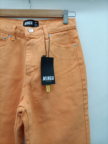 MINGA LONDON. Pantalón denim naranja T.34