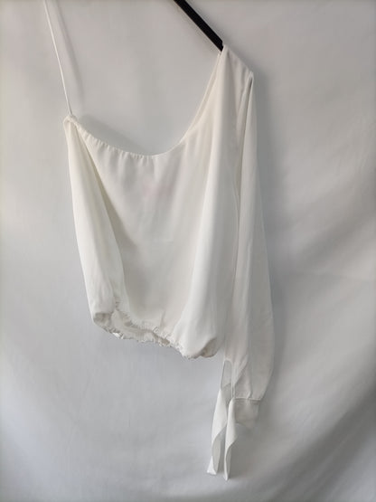 THE ARE. Blusa blanca asimétrico T.s