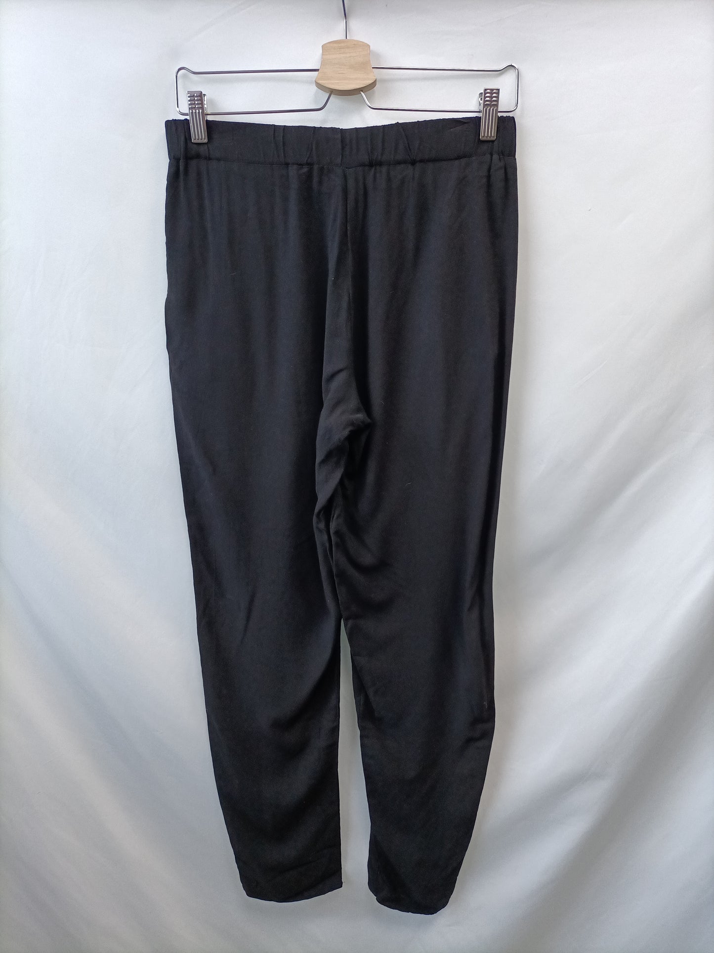 C&A. Pantalón Fluido negro T.s