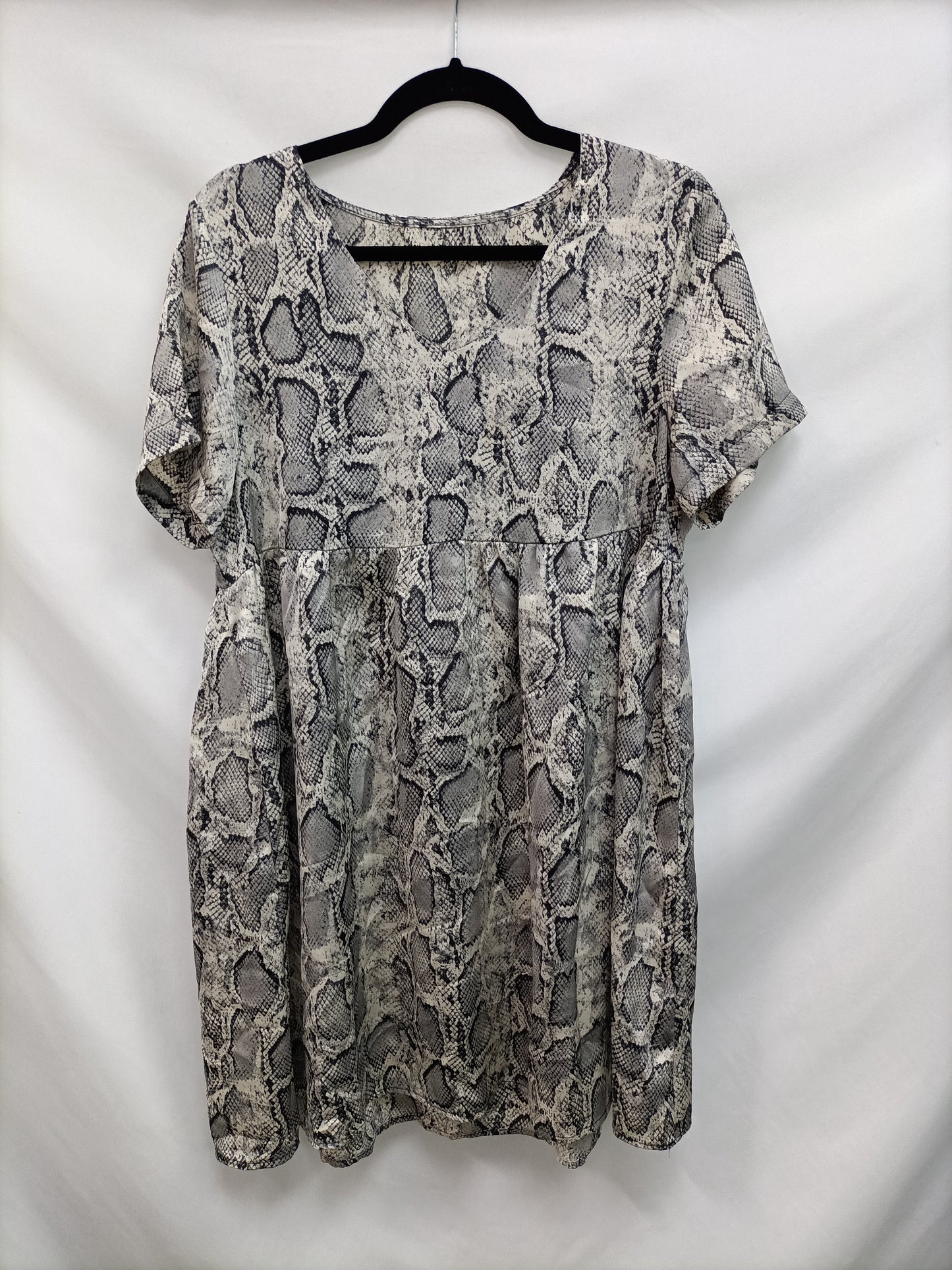 OTRAS. Vestido corto animal print T.l