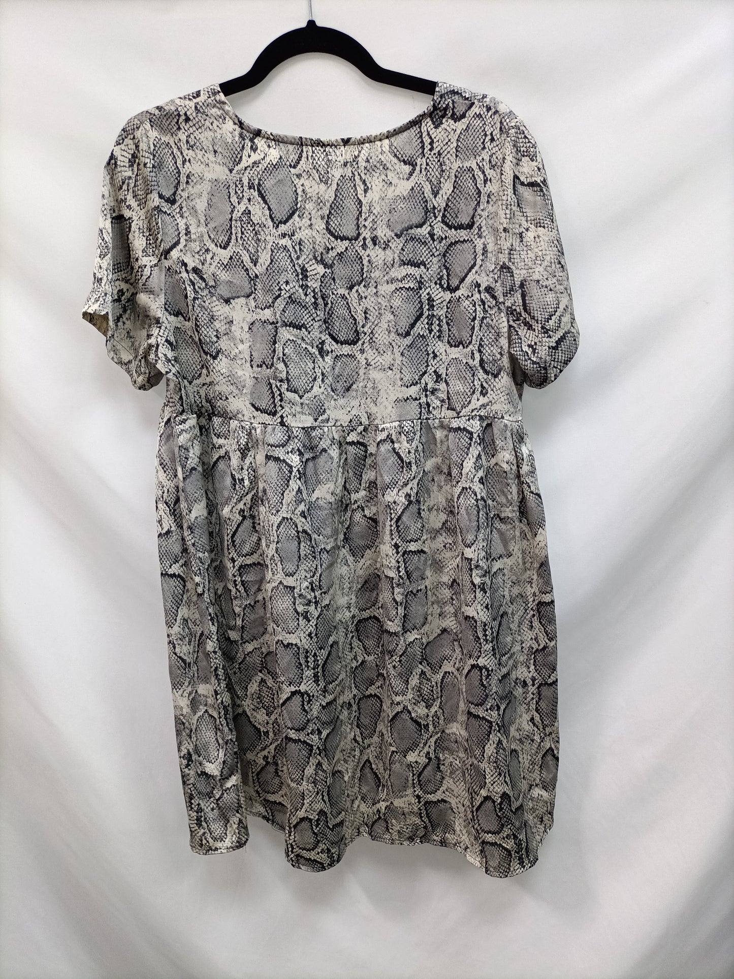 OTRAS. Vestido corto animal print T.l