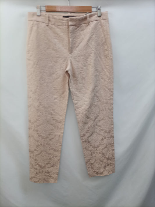 ZARA.Pantalones vestir bordados rositas T.m