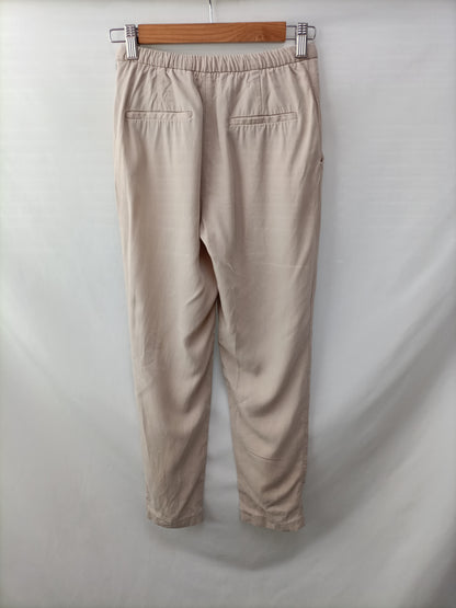 OTRAS (ZARA). Pantalón beige Fluido T.u(34)