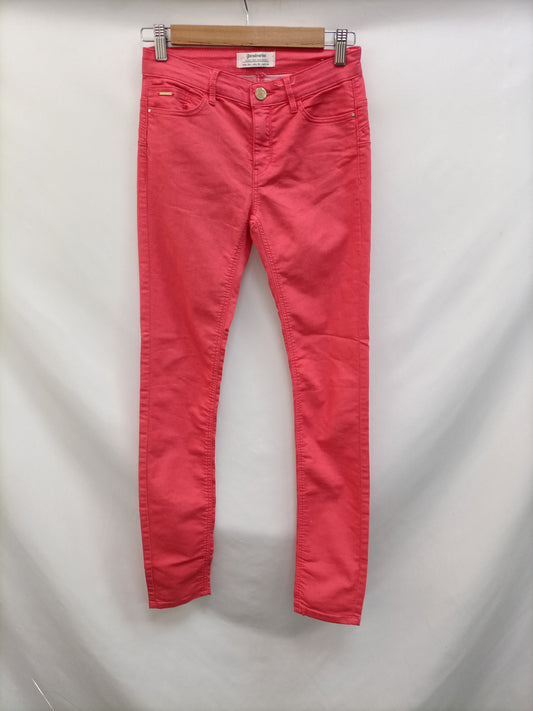 STRADIVARIUS. Pantalón rosa pitillo T.34