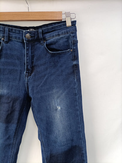 STRADIVARIUS. Pantalón denim rotos T.36