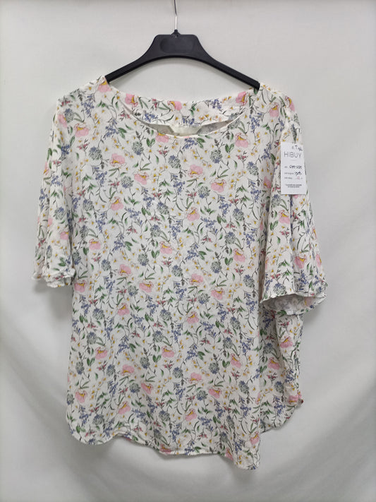 H&M. Blusa florecitas T. 48