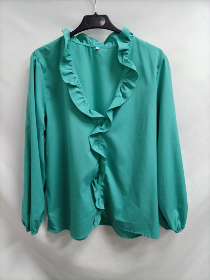 OTRAS. Blusa verde agua volante T.l