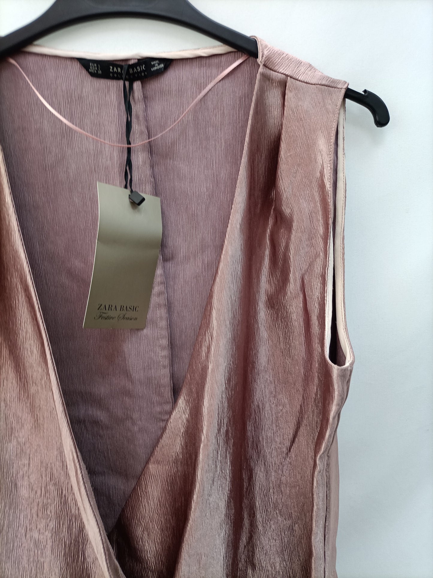 ZARA.Top rosa brillo T.S