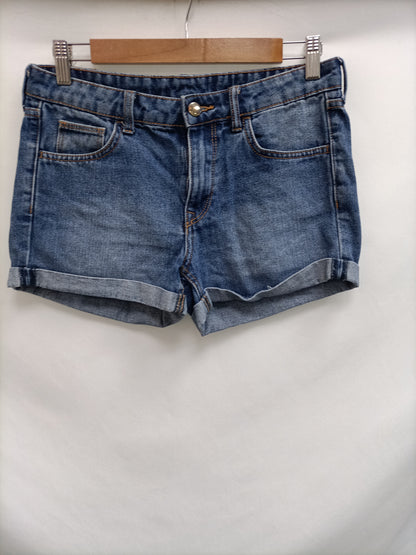 H&M. Short denim dobladillo T.36