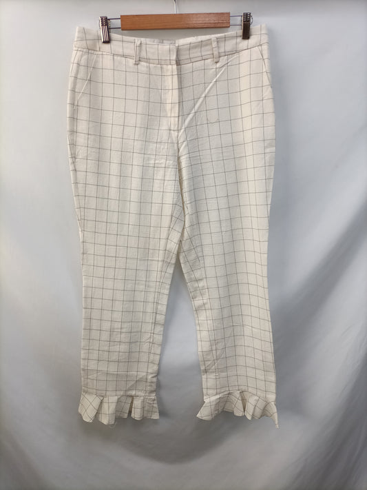 SCALPERS. Pantalón beige cuadros T.40