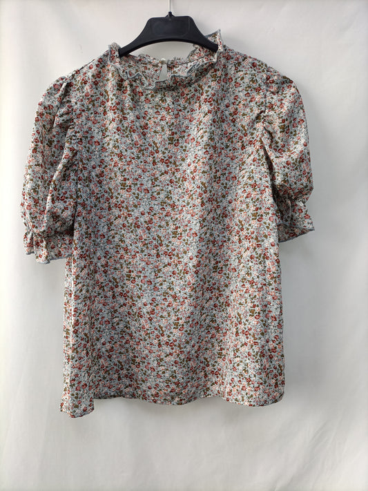 OTRAS. Blusa azul flores T.u(s)