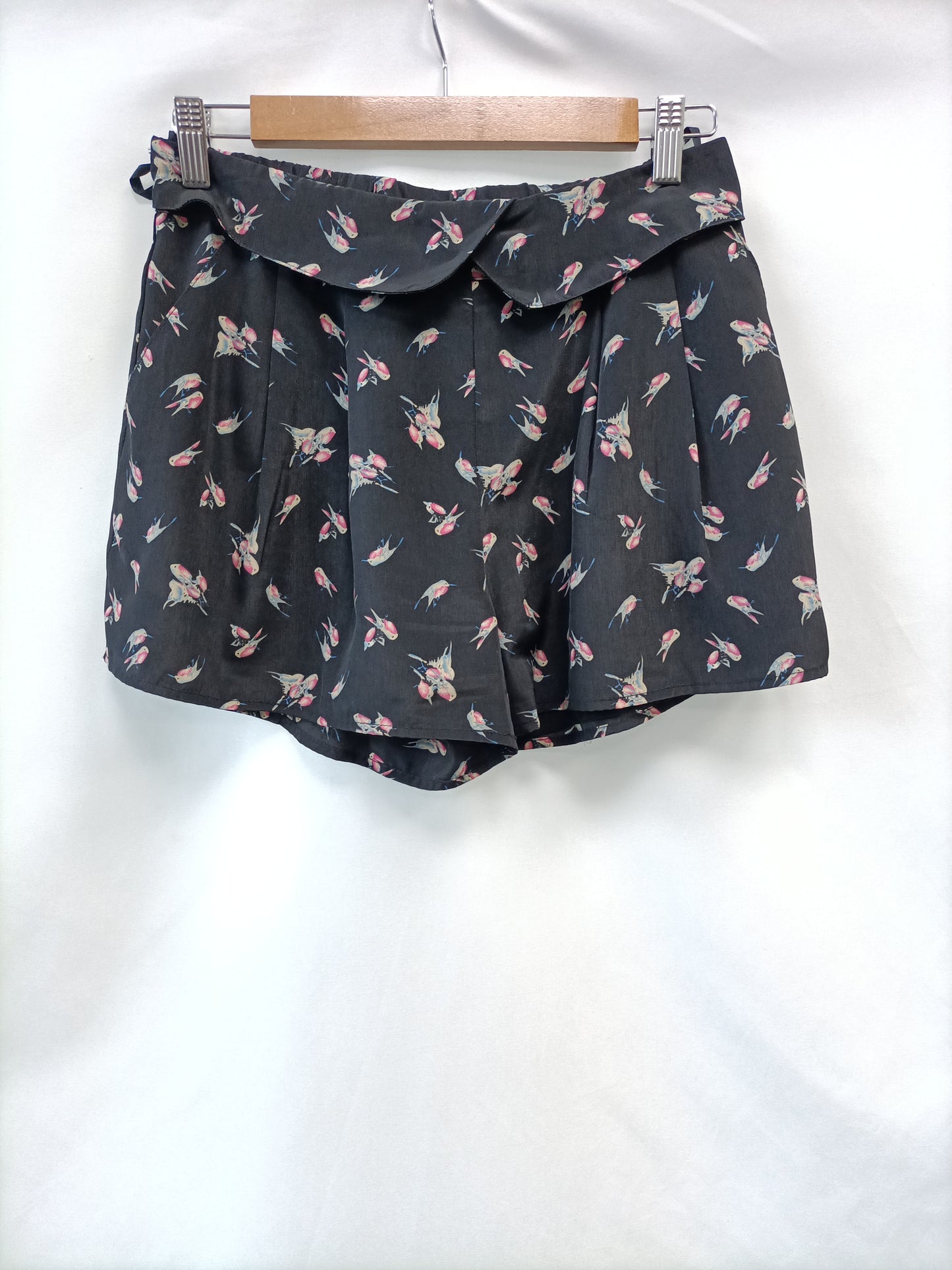 SEE U SOON.Shorts pájaros T.38