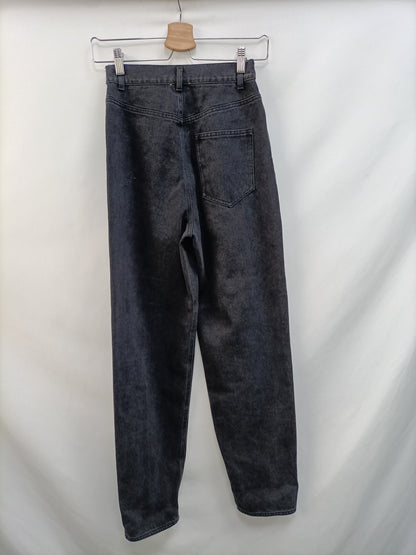 INDIGO UNIQUE. Pantalón negro ancho T.32