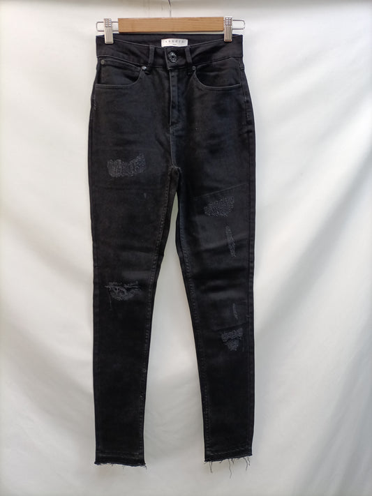 SANDRO. Pantalón negro desgastes T.32