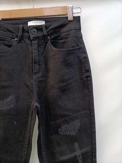 SANDRO. Pantalón negro desgastes T.32