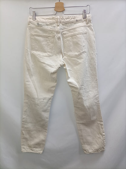 ZARA. Pantalón beige rotos T.34