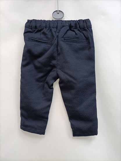 PRIMARK. Pantalón azul textura T.6-9 meses