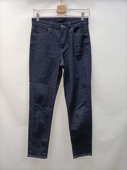 UNIQLO. Pantalón denim oscuro T.36