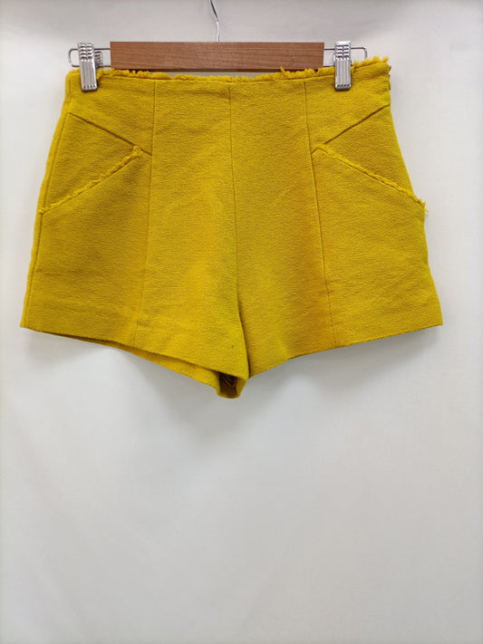 ZARA. Shorts mostaza textura T.s