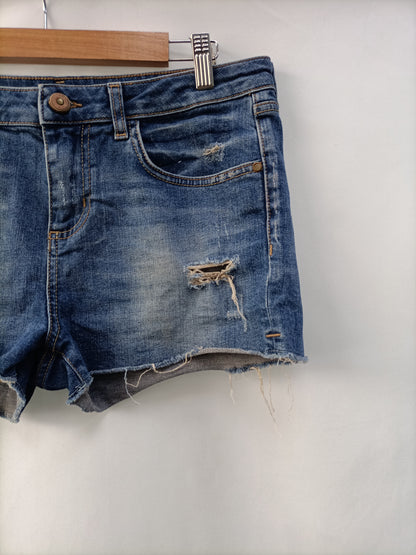 ZARA.Shorts denim rotos T.42