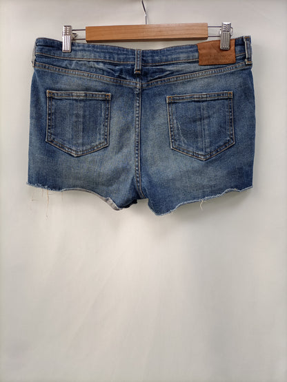 ZARA.Shorts denim rotos T.42