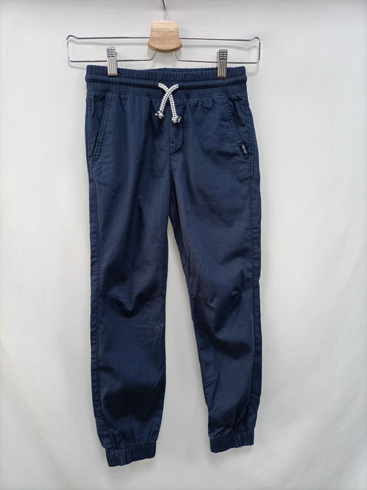 H&M. Pantalón azul T.7-8 años