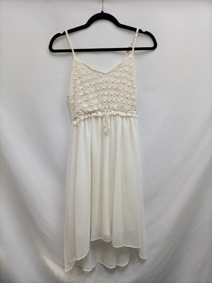 FORMULA JOVEN. Vestido blanco croché T.38 (tara)