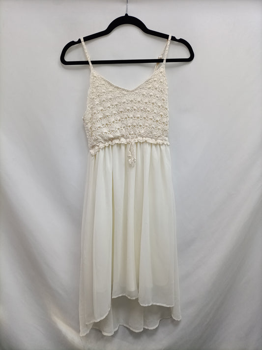 FORMULA JOVEN. Vestido blanco croché T.38 (tara)