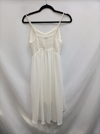 FORMULA JOVEN. Vestido blanco croché T.38 (tara)