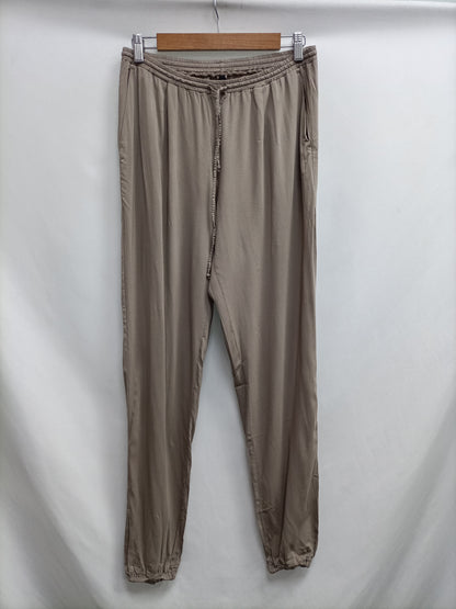 EUROPEAN CULTURE. Pantalón fluido beige T.s