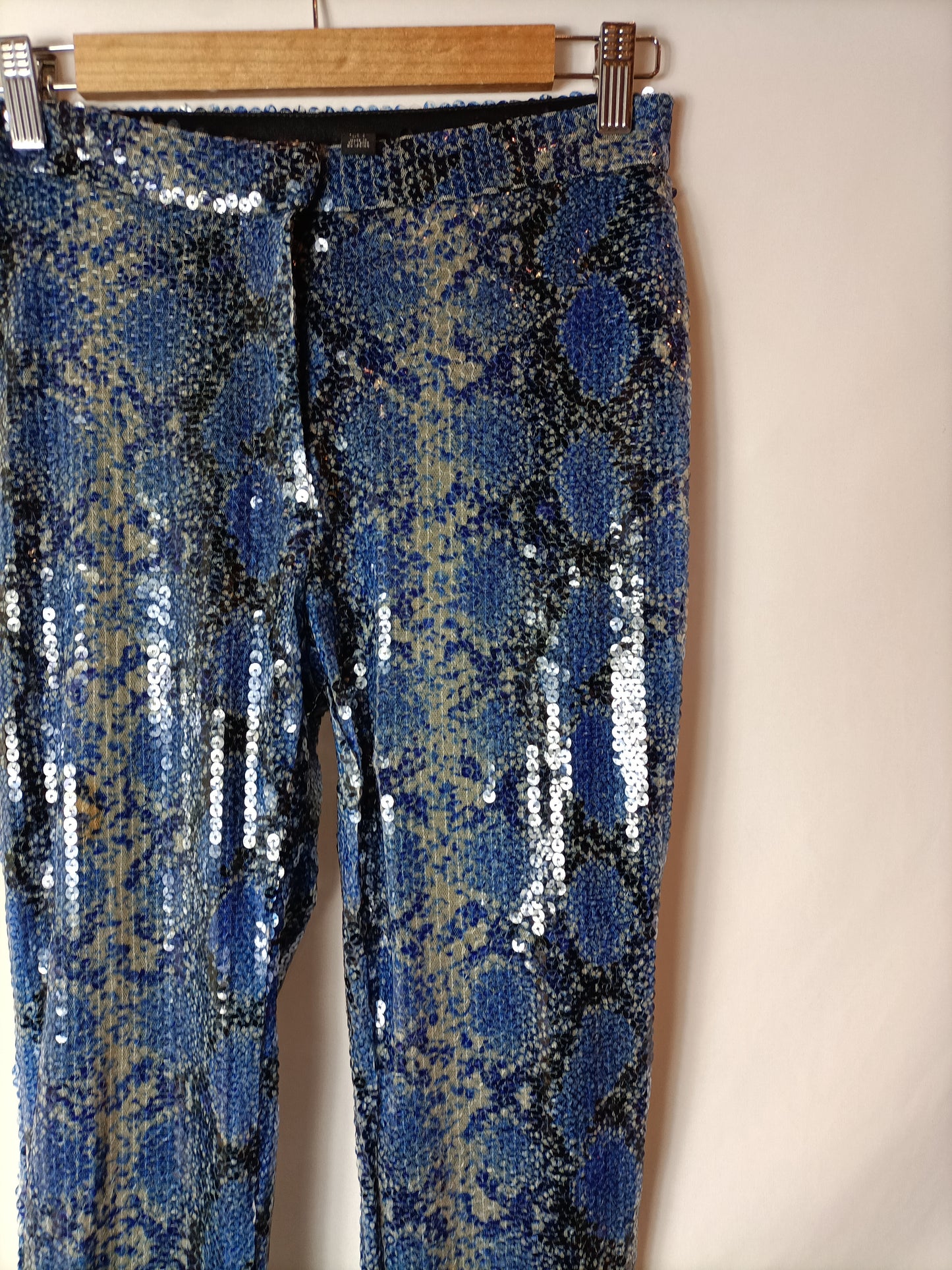 TOP SHOP . Pantalones lentejuelas animal printi. T 36