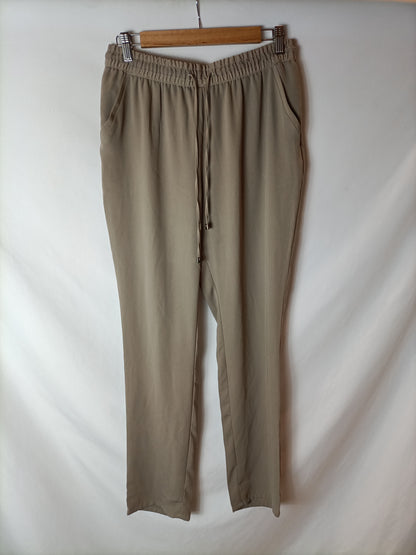 MANGO. Pantalón fluido beige T.m