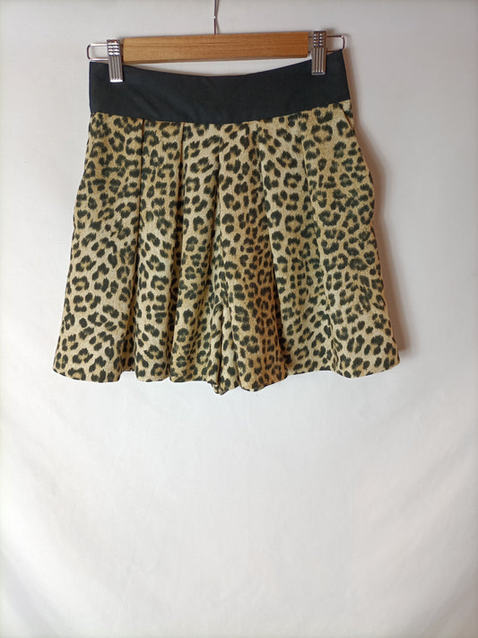 ZARA. Bermudas efecto falda animal print. T.XS