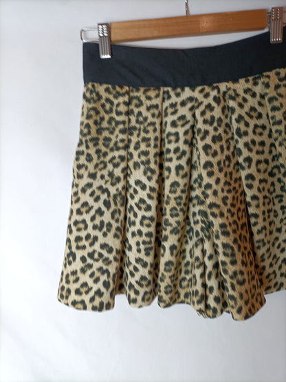 ZARA. Bermudas efecto falda animal print. T.XS