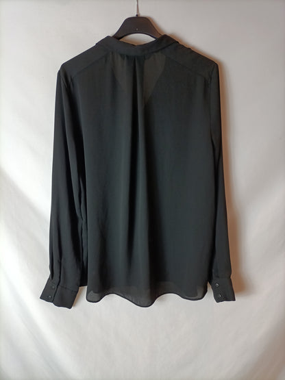 ZARA. Blusa semitransparente  negra. T M