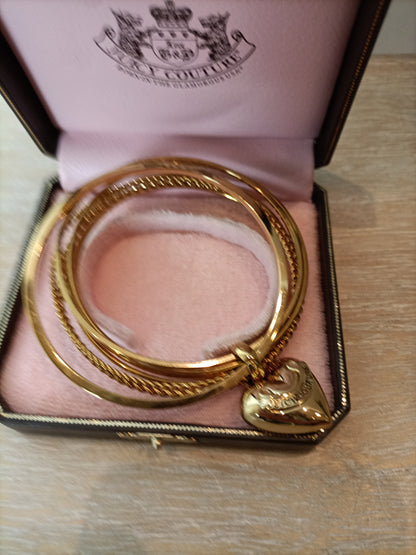 JUICY COUTURE. Pulsera dorada corazón