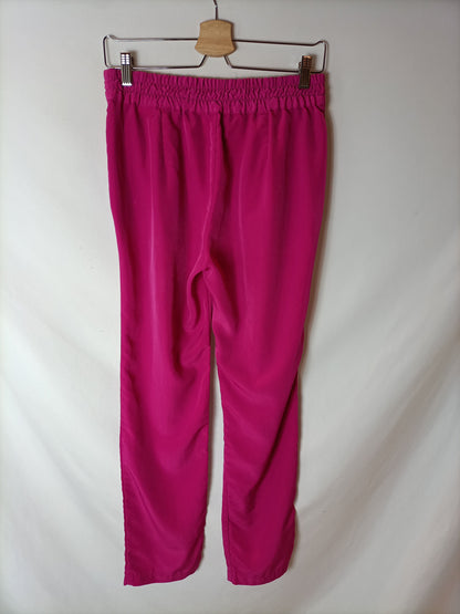 ZARA. Pantalón fluido rosa. T M