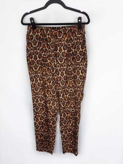 H&M. Pantalón animal print talla 40