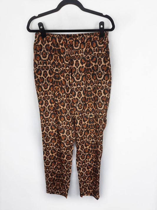 H&M. Pantalón animal print talla 40