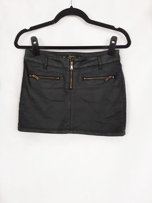 ZARA. Falda negra talla 38