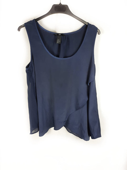 H&M.Blusa azul doble textura T.38