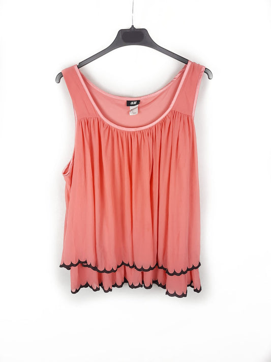 H&M.Top rosa volantes T.44