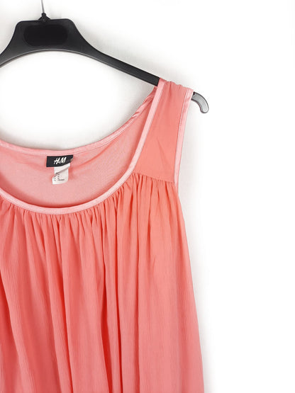 H&M.Top rosa volantes T.44