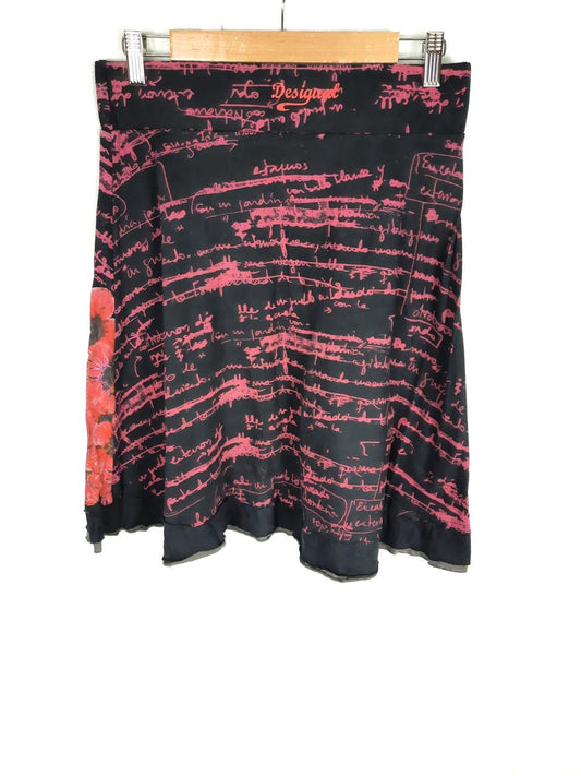 DESIGUAL. Falda corta negra escrita T.m