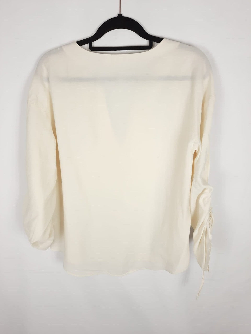 H&M. blusa pico T.46