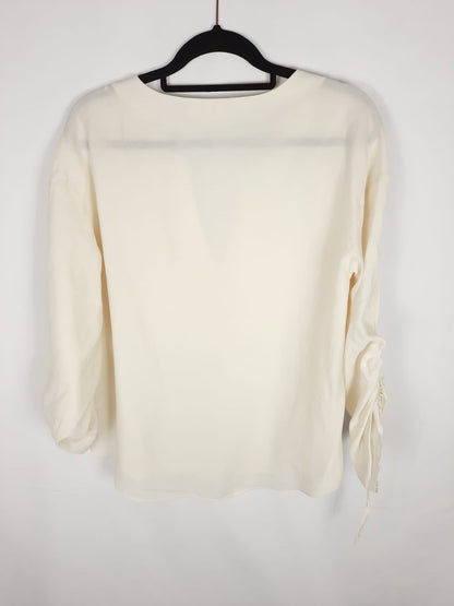 H&M. blusa pico T.46