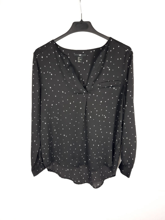 H&M. Blusa fluida negra estrellas T.34